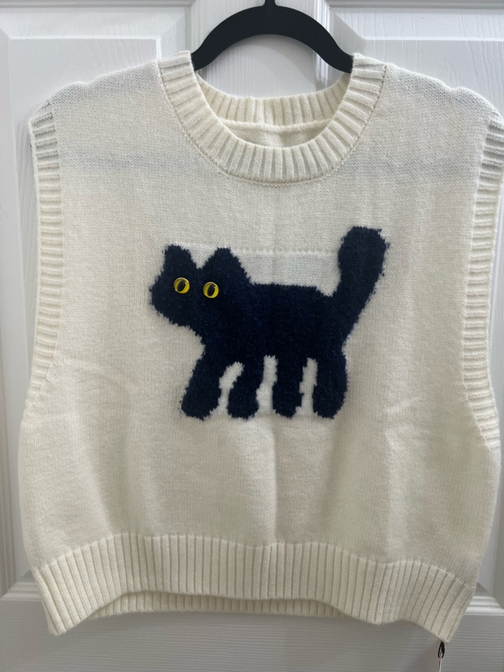 Cider Cream Knit Cat Appliqué Vest with Navy Fuzzy Cat and Yellow Eyes